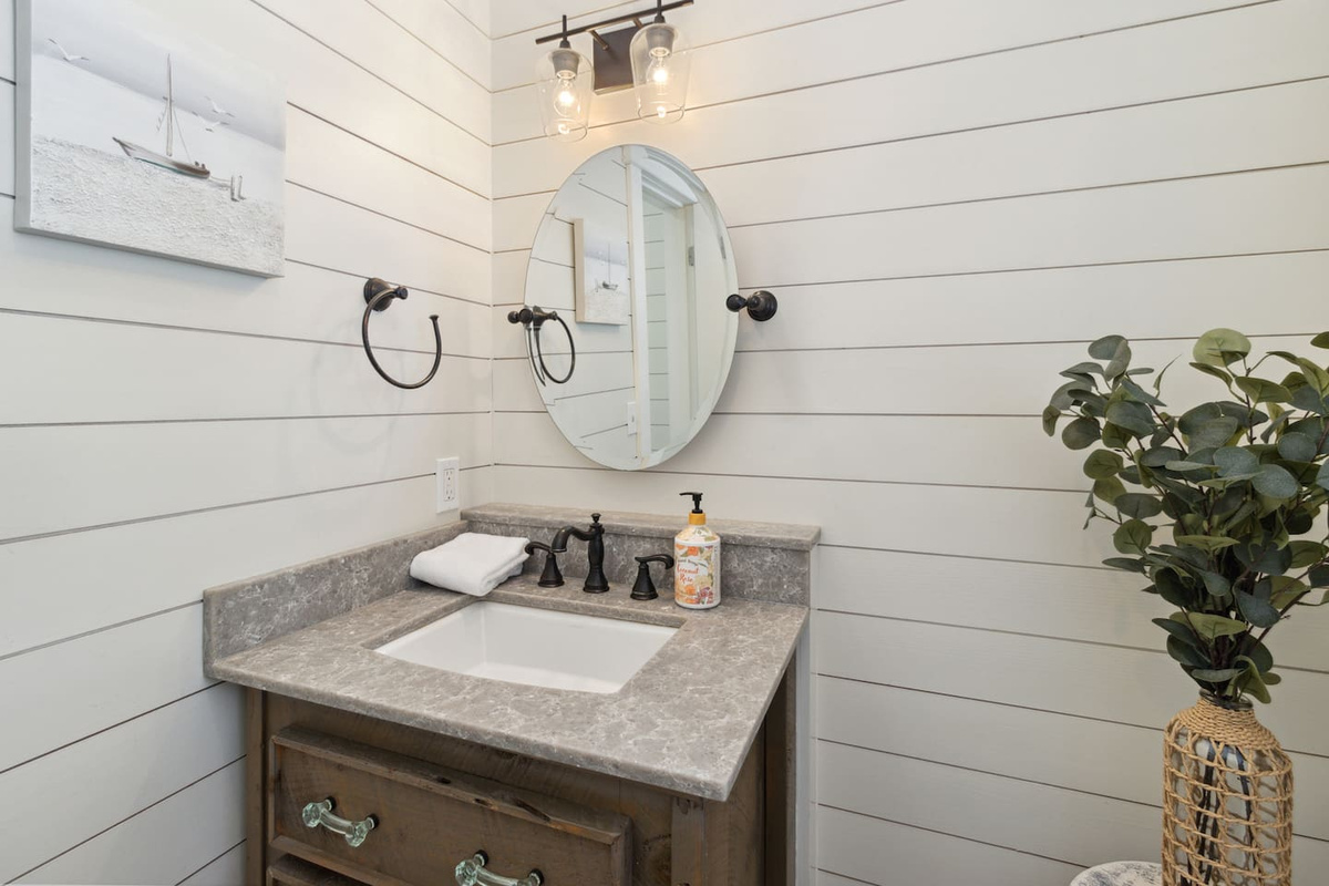  Half bath on the main floor &mdash; no need to head upstairs when you're in the middle of dinner or a deck session.