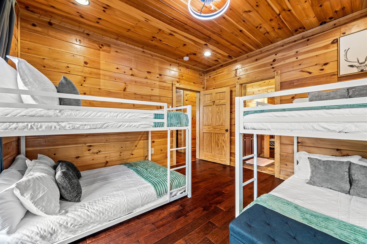  Bedroom 7 (downstairs) has two full over full bunk beds and shares a Jack & Jill bathroom with Bedroom 6.