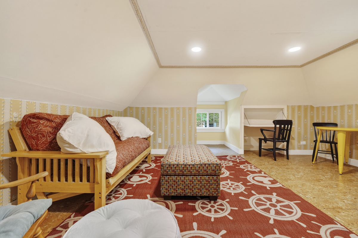 Kids hang out space with a futon for an extra sleep space 