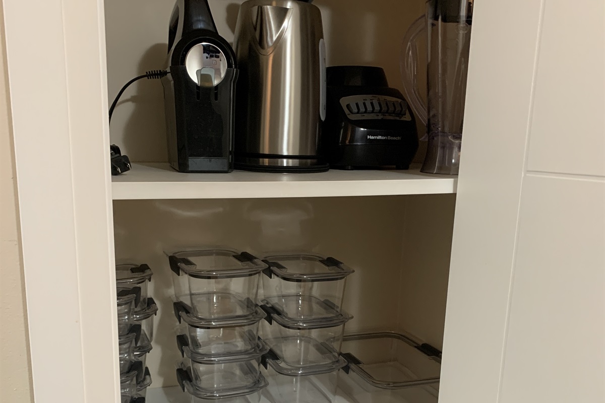 Kitchen appliances and storage containers.