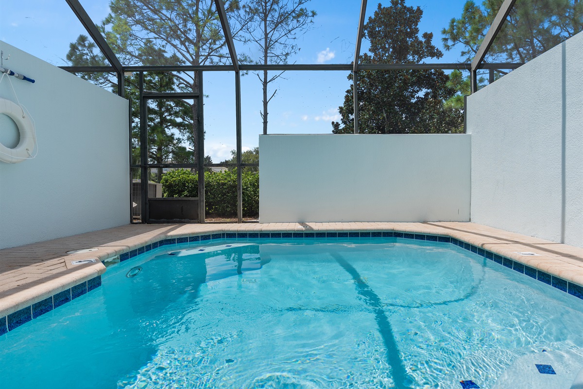 Private screened pool with lanai and no rear neighbors at Belle’s Villa