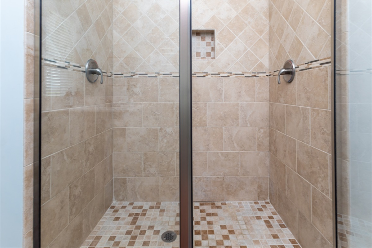 Dual shower heads in the master bathroom