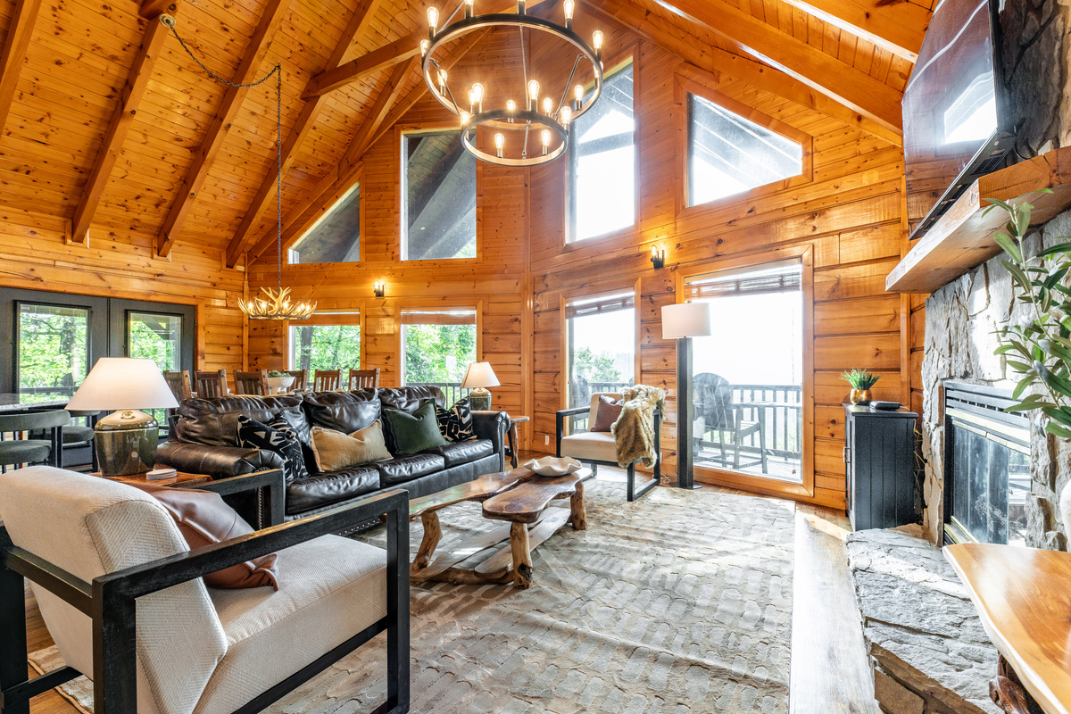 Open living area with large windows where family and friends can hang out