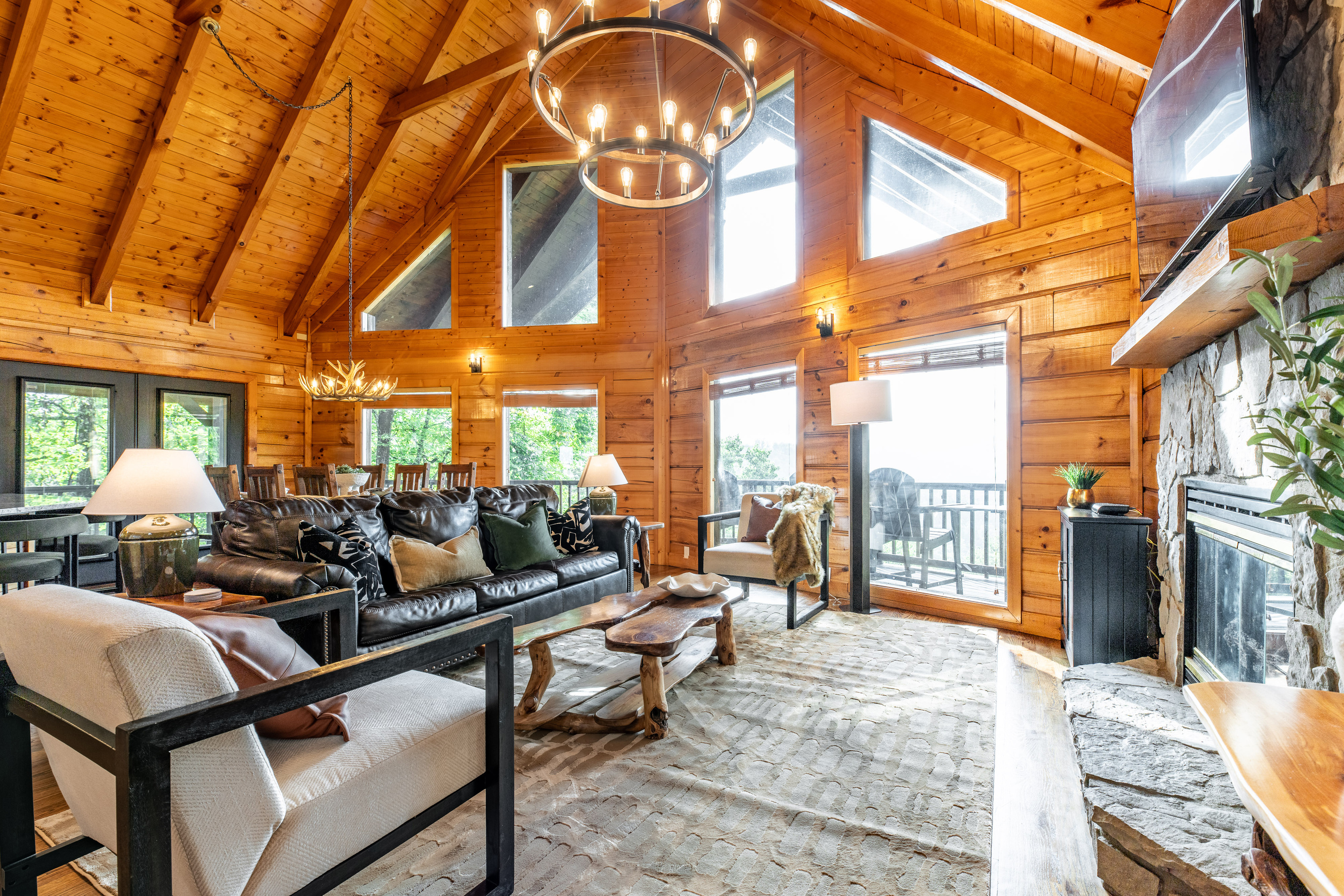 Open living area with large windows where family and friends can hang out