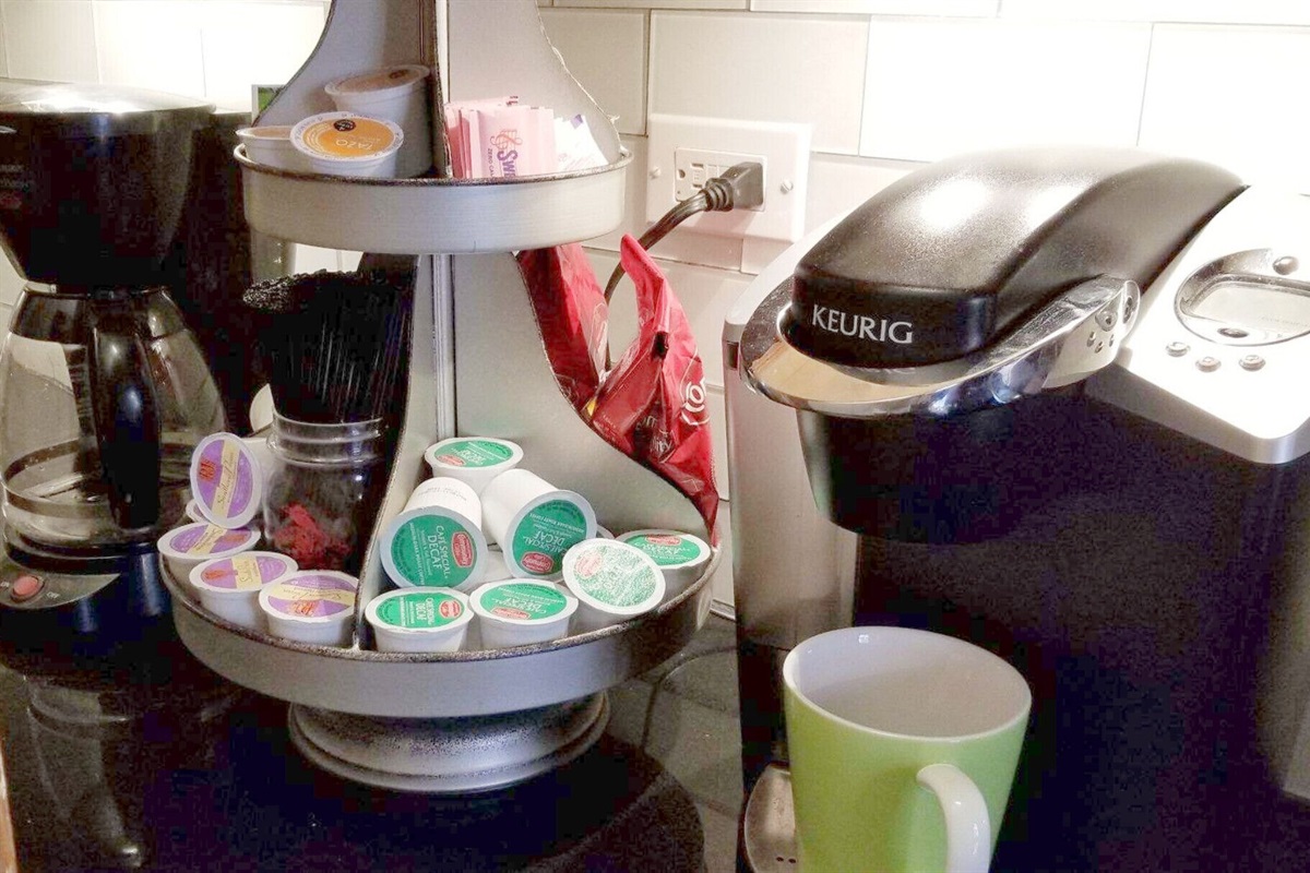 COFFEE BAR W/KEURIG AND FULL POT BREWING. COFFEE, CREAMERS, PODS PROVIDED.