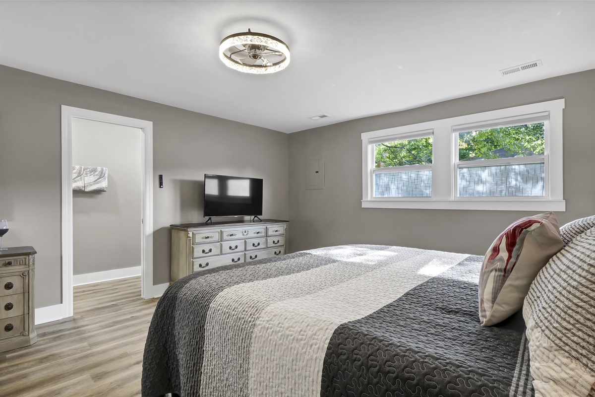 Smart TV in the master suite provides streaming options from the comfort of your bed.