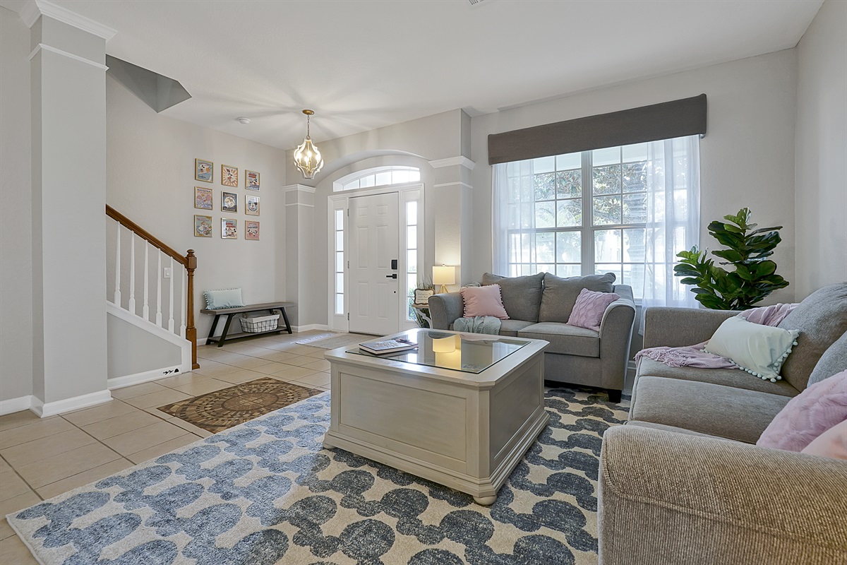 Functional and fun- inside the glass topped coffee table is loads of fun vintage Disney memorabilia. Anyone remember E-tickets?