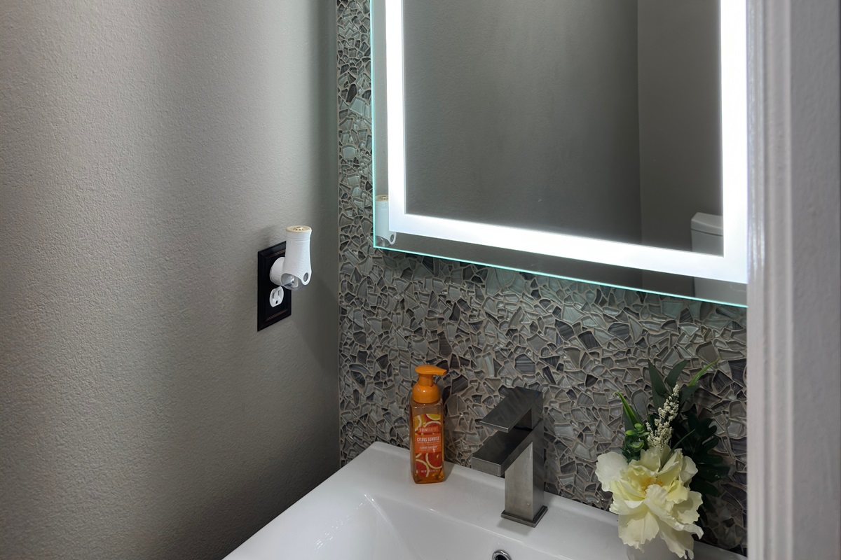 Simple half bath offering quick, fresh convenience.