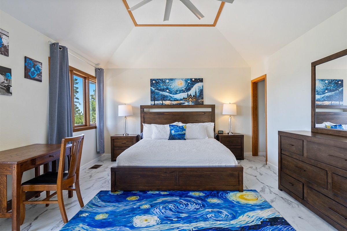 Dreamy ensuite retreat with plush bedding for ultimate comfort.