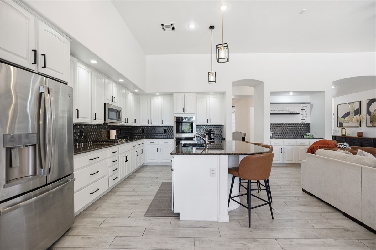 Roomy kitchen with plenty of counter space to prepare a meal the enter group can enjoy.