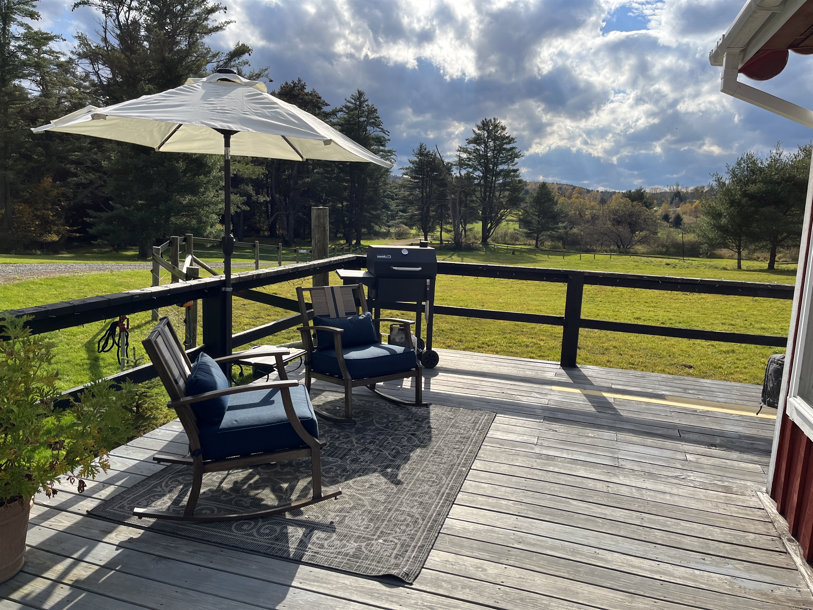 Horse Haven outdoor seating overlooking the horse pasture.