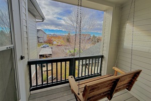 Relax on the balcony's cozy swing, soak in breathtaking mountain views, and take a refreshing break from it all