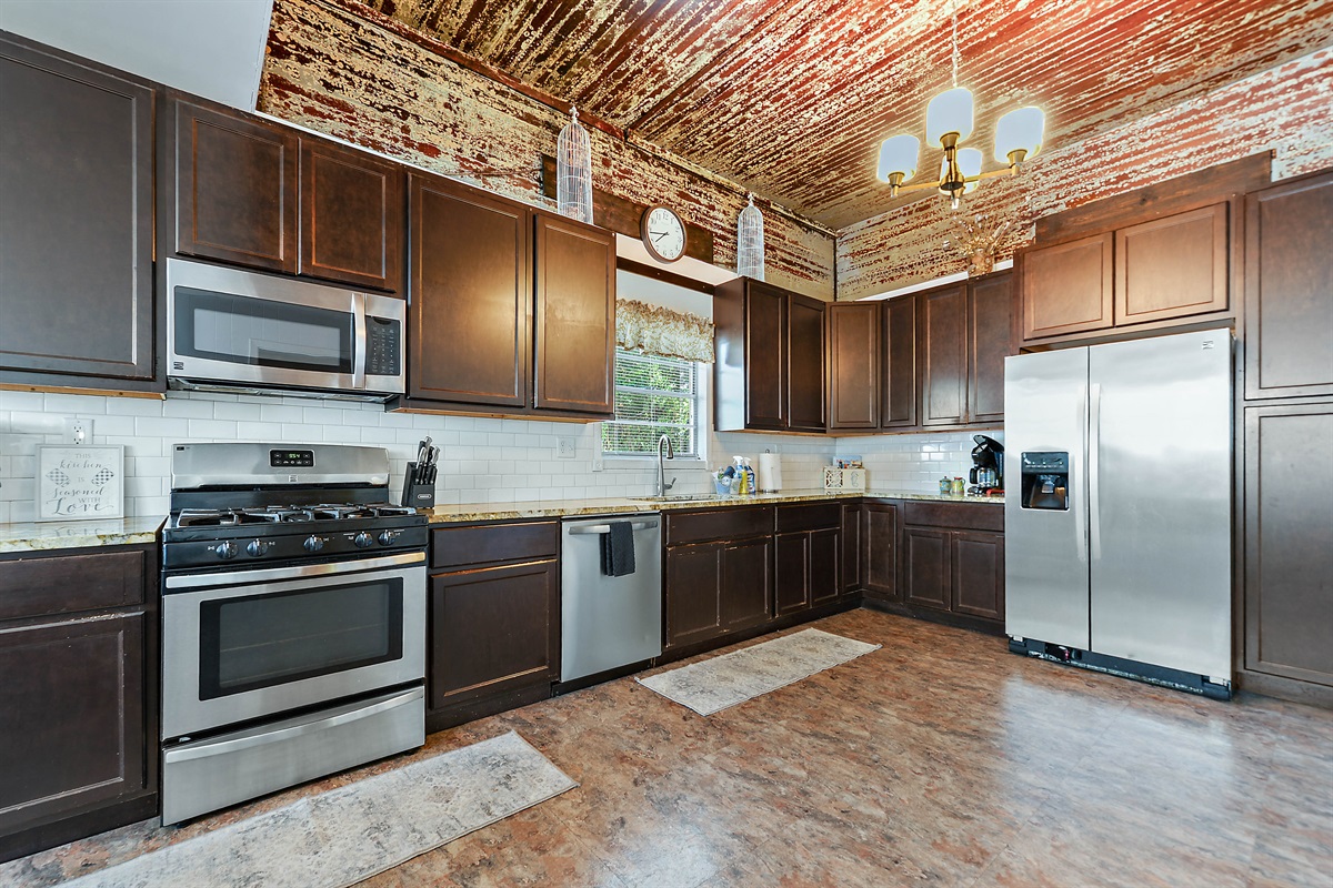 Renovated kitchen with beautiful exposed ceilings.