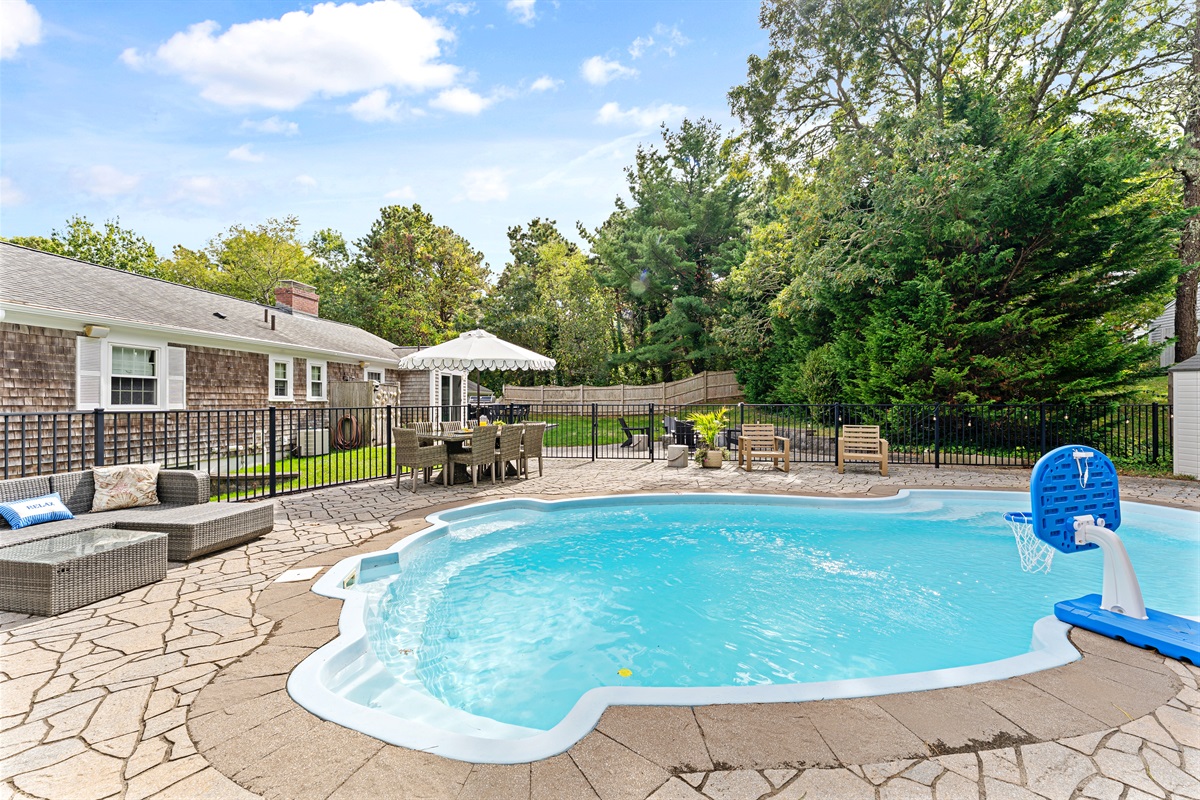 This beautiful South Dennis getaway offers a private pool, perfect for sunny Cape Cod days.