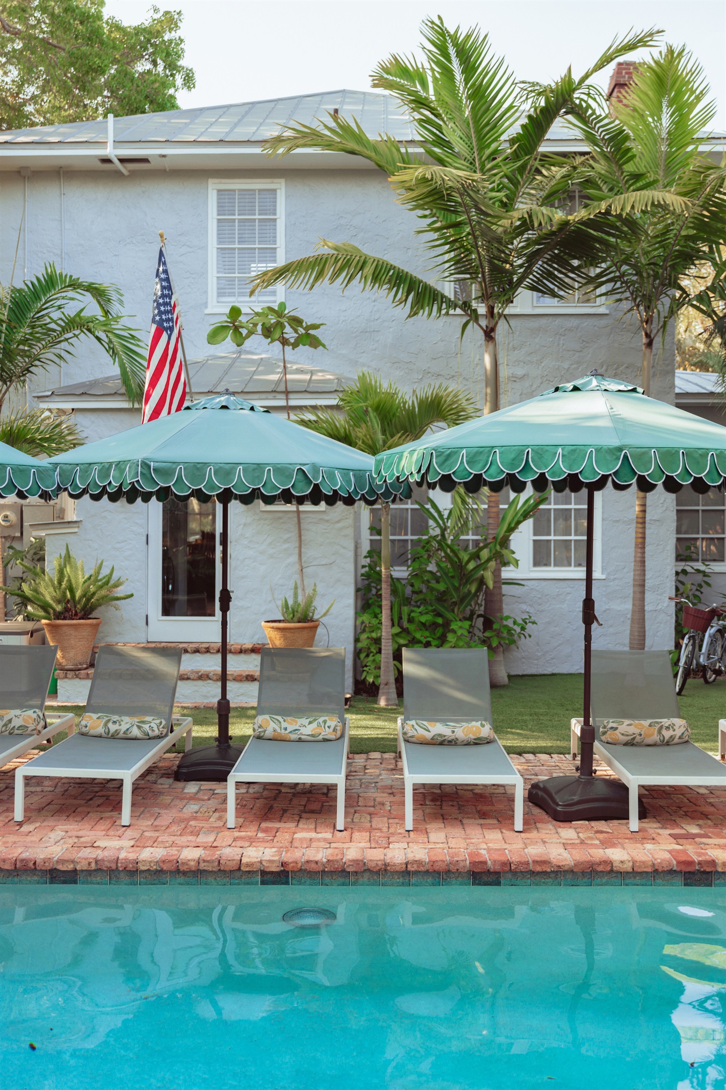 Our idyllic, sun-splashed pool (shared) is right out of a summer dream.ol is right out of a summer dream.