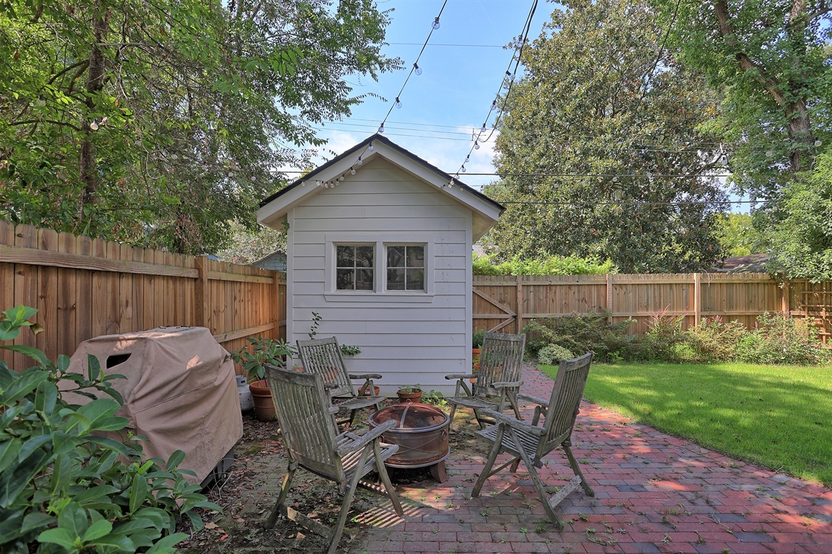 The backyard firepit creates a cozy ambiance for gatherings and quiet nights alike.