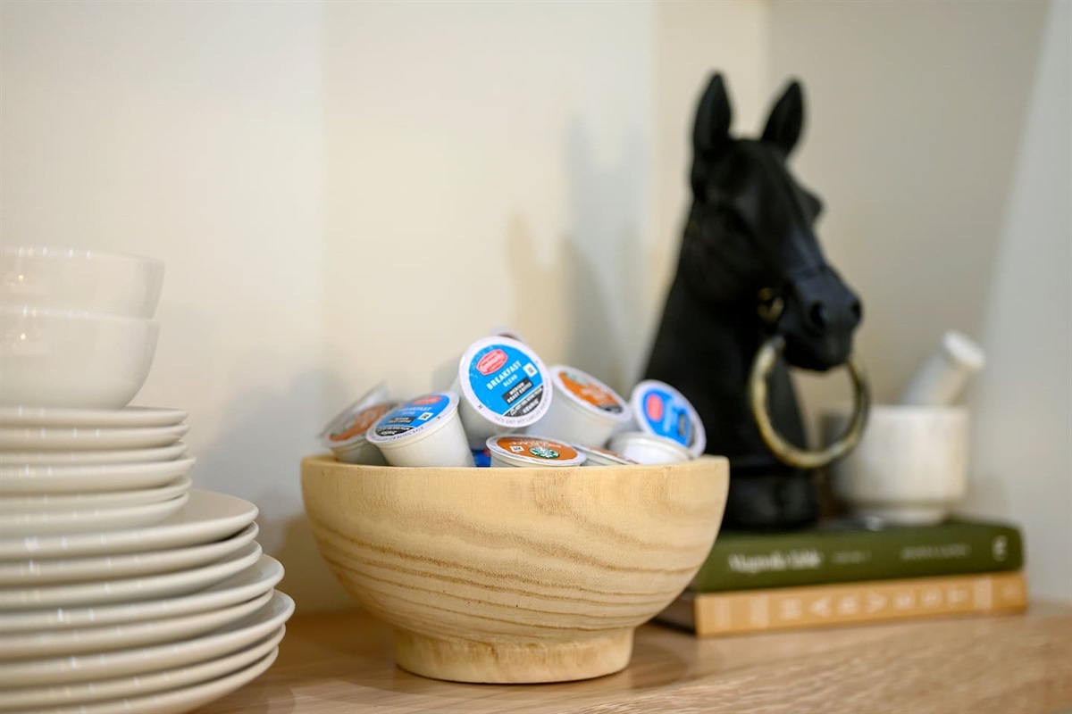 We provide a starter of K-Cups as well as ground coffee. We also provide tea if that's more your jam. 