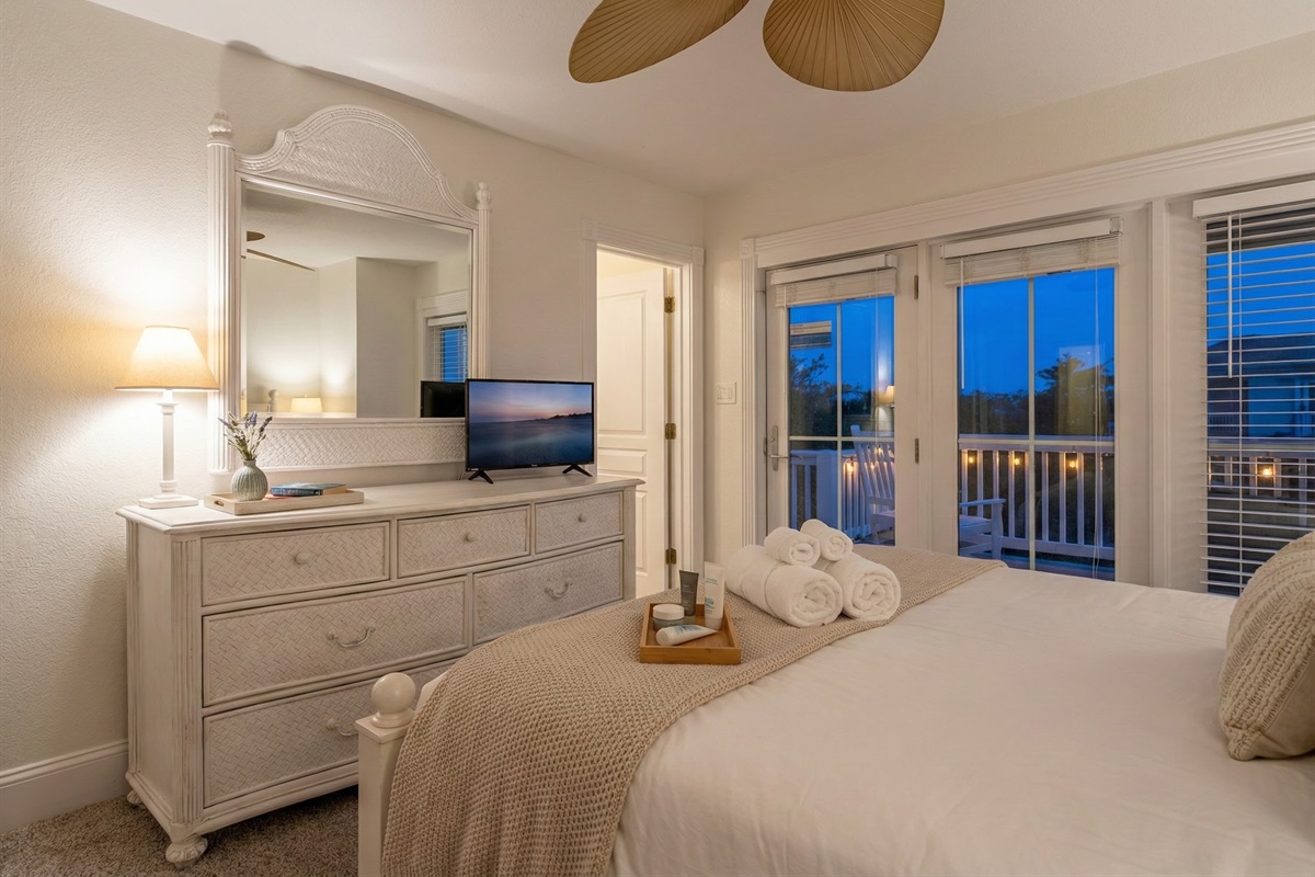 Get ready for a peaceful and luxurious experience in The Hemingway's master bedroom! Dressing up has never been more enjoyable than in this room, with an expansive dressing table complete with