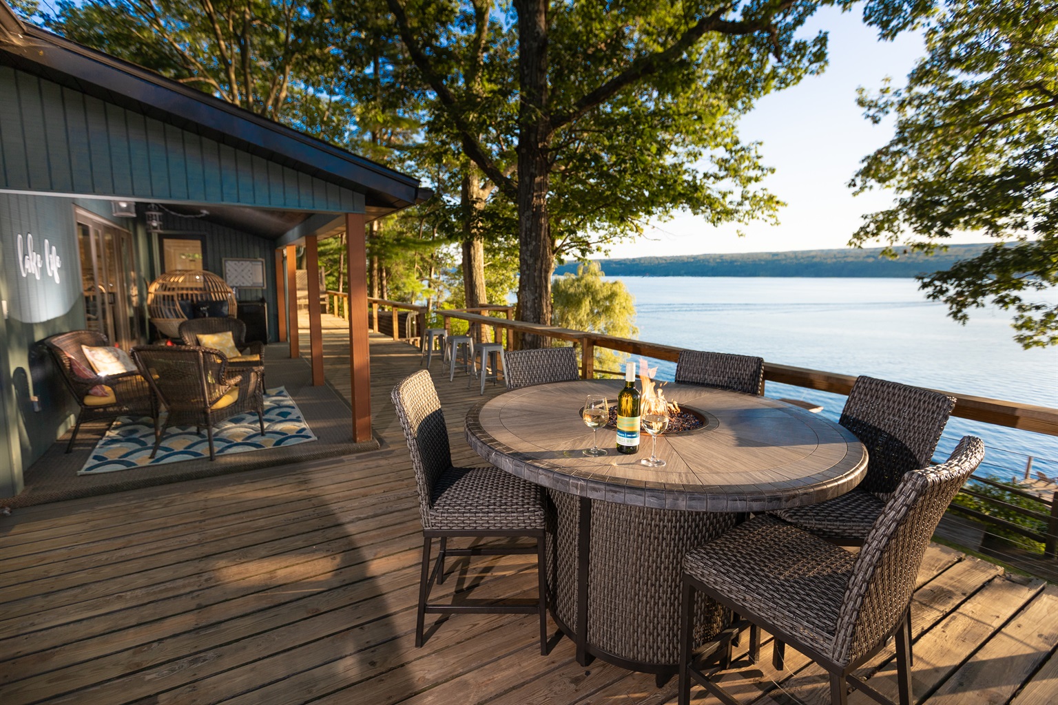 Deck | 800 sq/ft with amazing lake views | Propane fire table seats 6 | Gas Grill | Additional Seating Under Covered Area or at Railing Bar Top