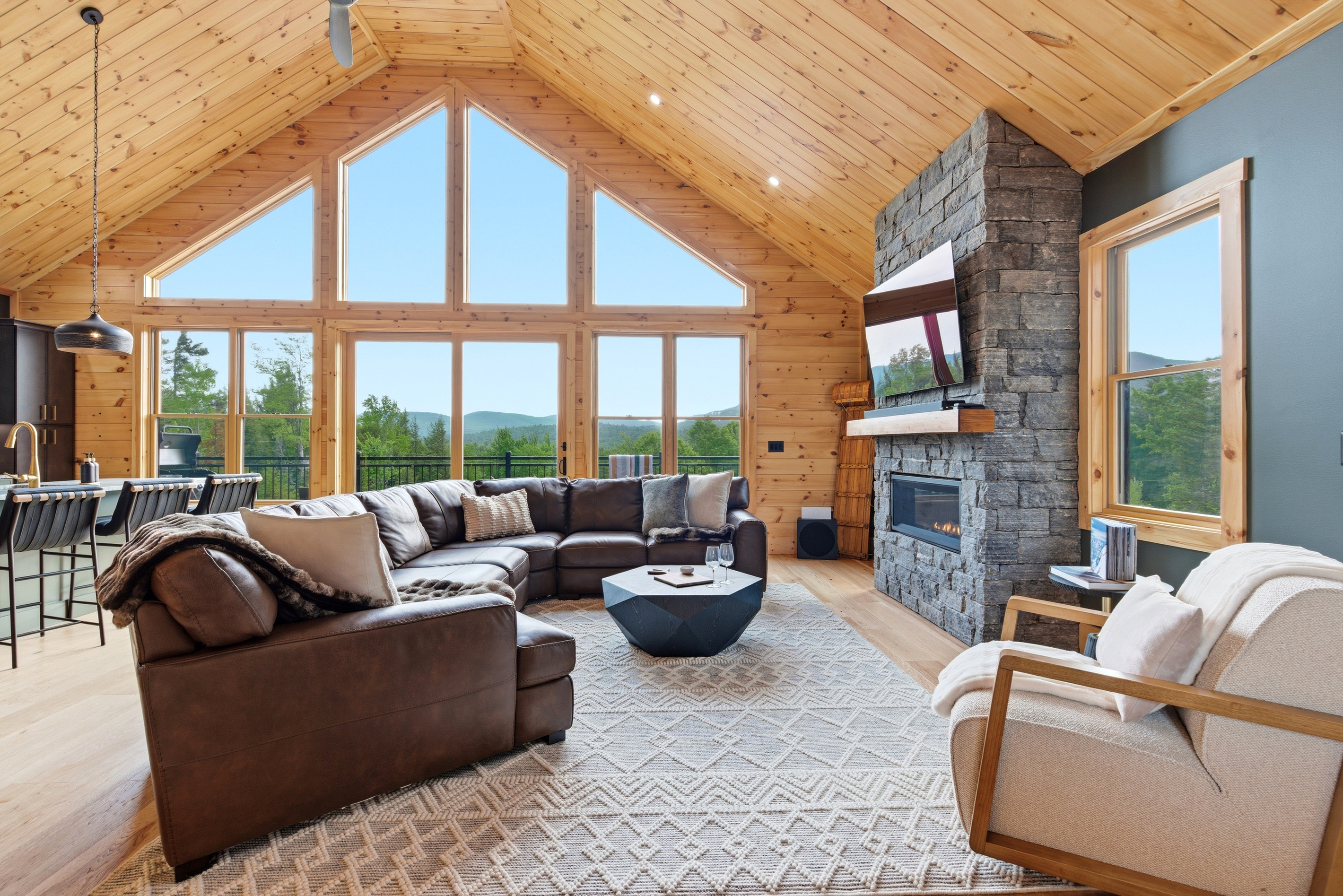 Enjoy our spacious living area framed by stunning outdoor scenery!