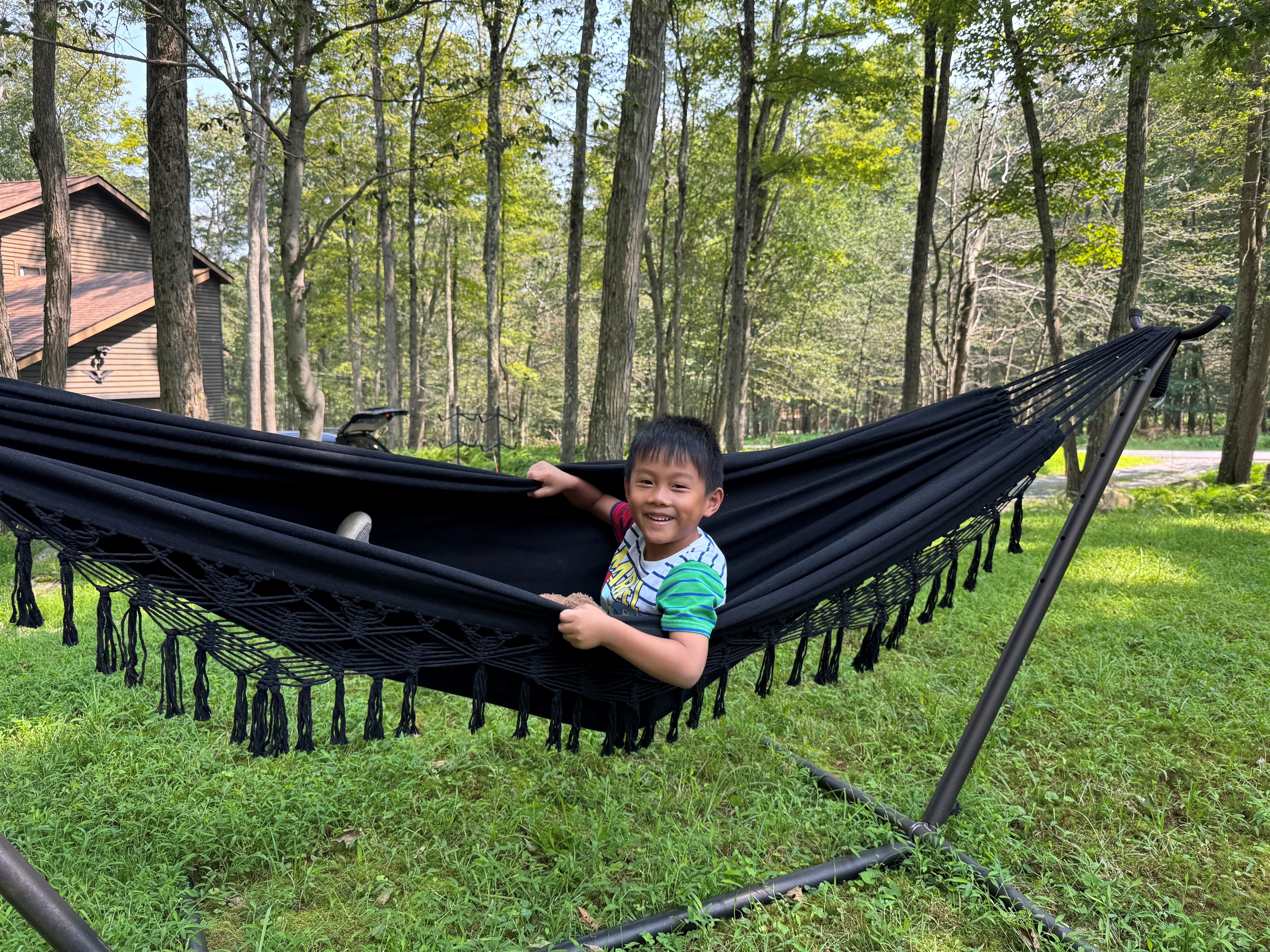 Lil guy loving the hammock action.