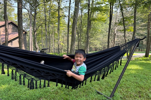 Lil guy loving the hammock action.