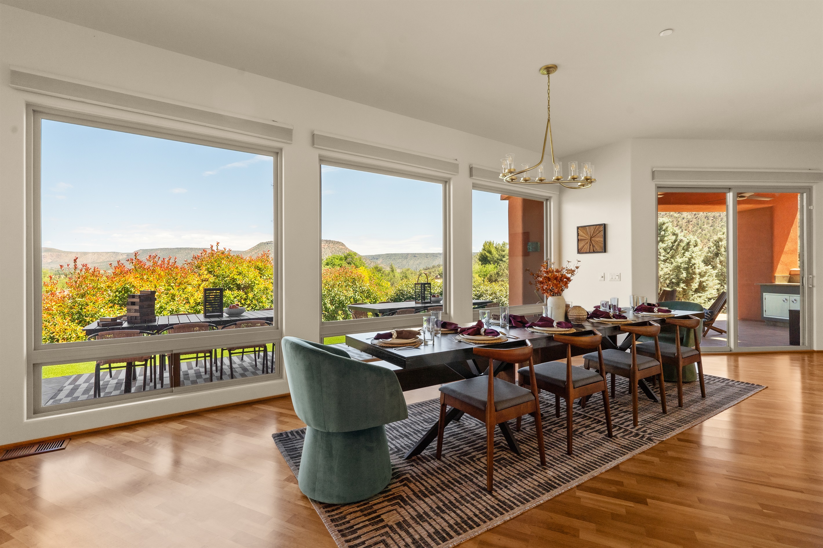 Enjoy meals with a breathtaking backdrop. Three massive picture windows flood the dining space with natural light and frame the beautiful Sedona landscape perfectly.