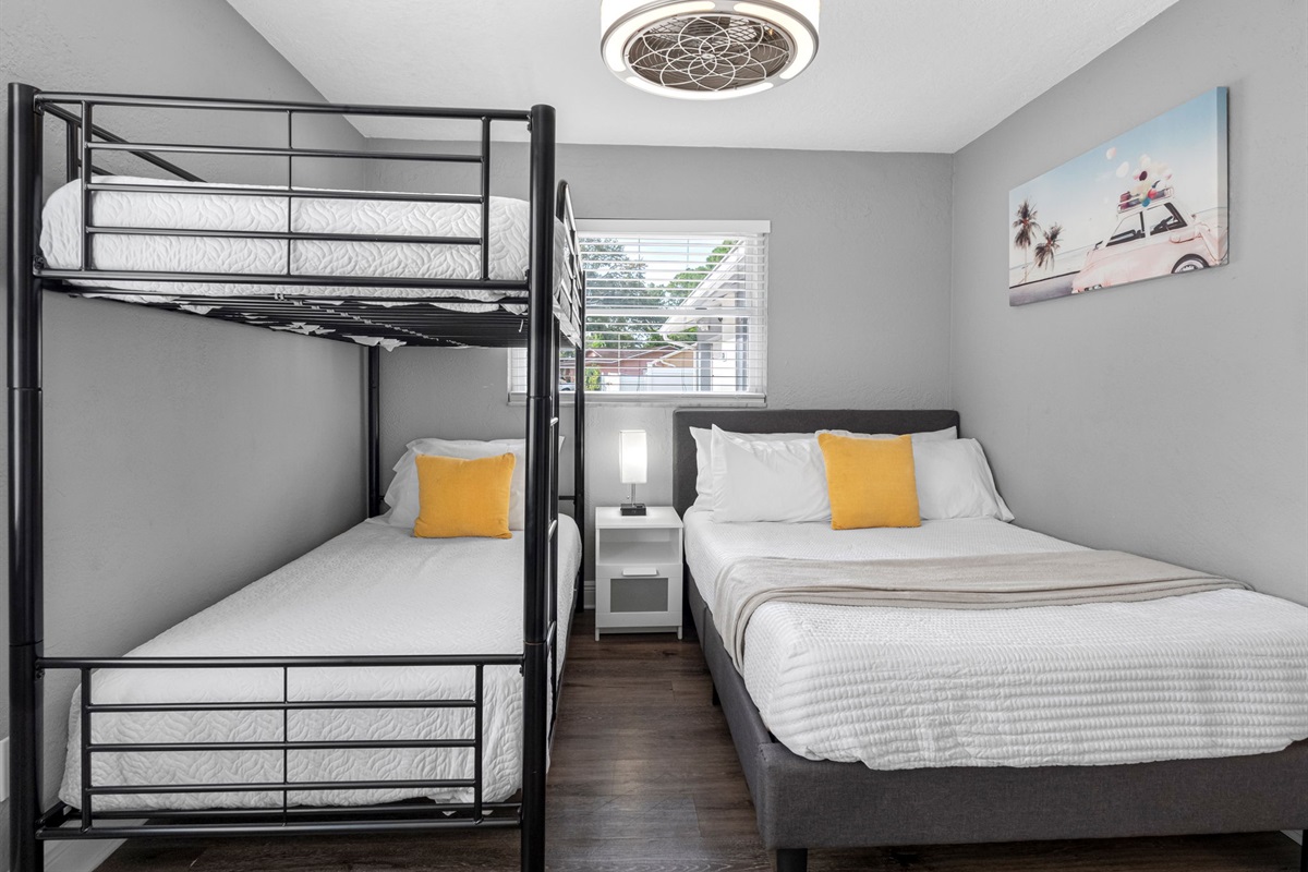 With sleek black metal bunks and crisp white linens, this room is ready for adventure-filled days and restful nights.
