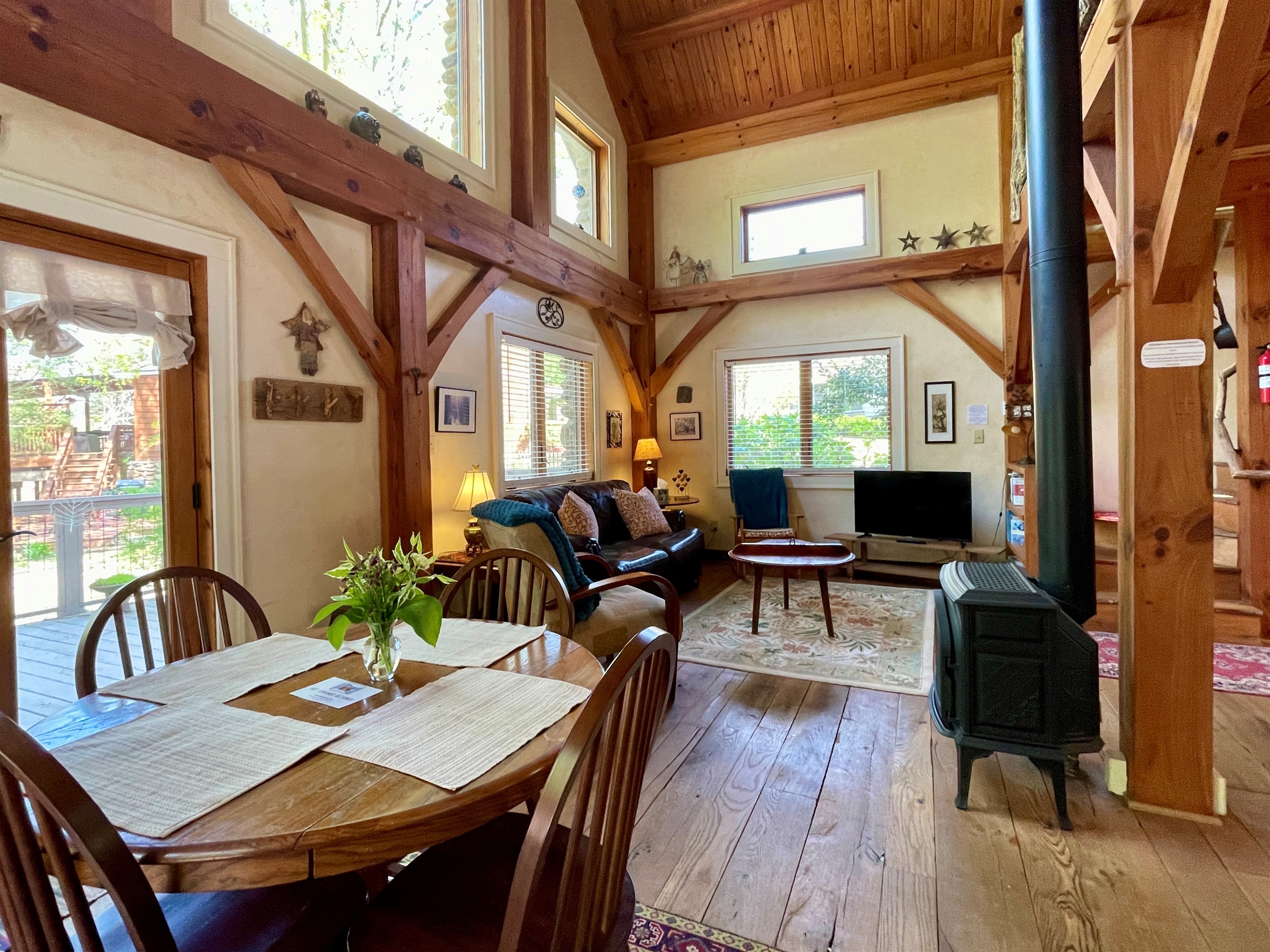 Light fills this beautiful post and beam living room.