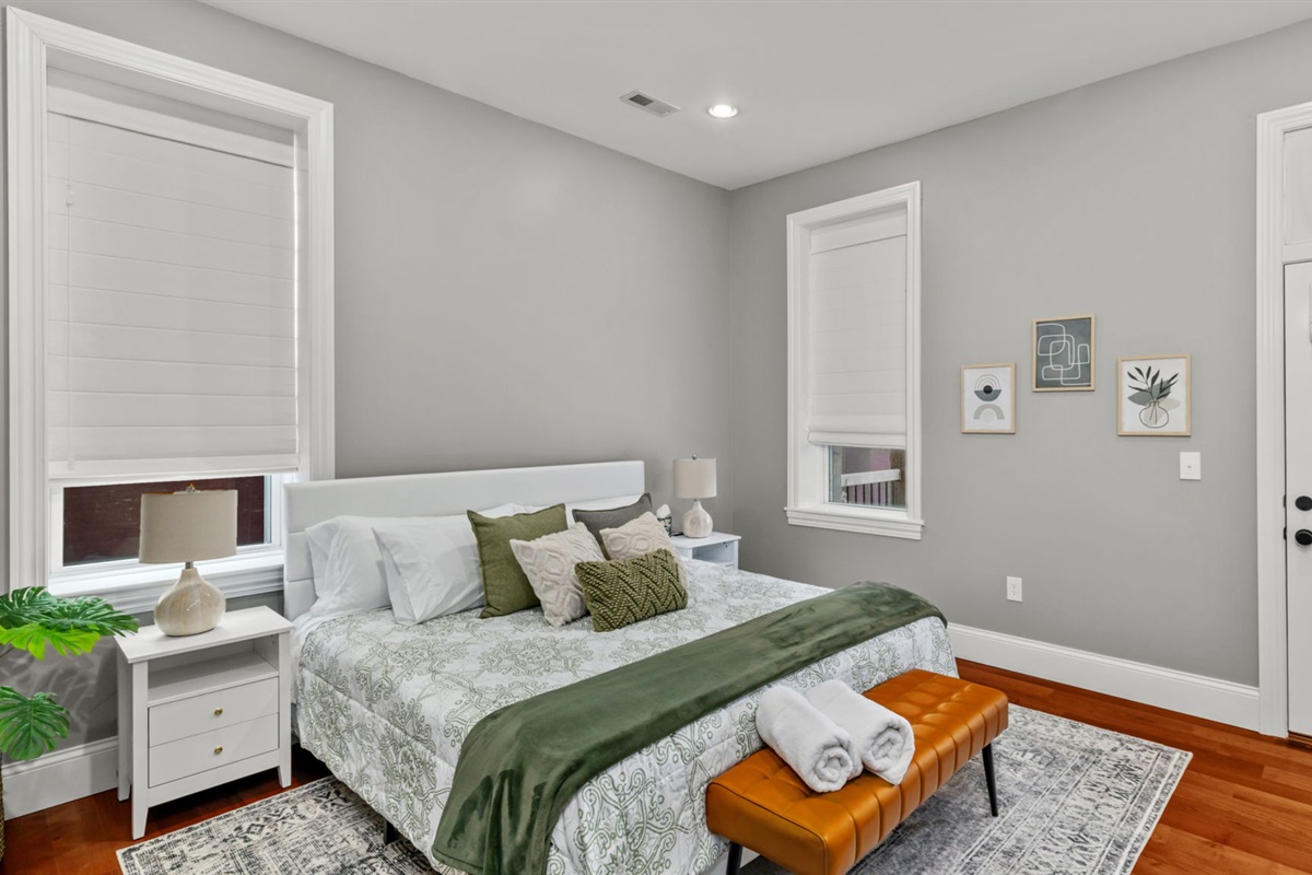Master bedroom beautifully appointed with King size bed.