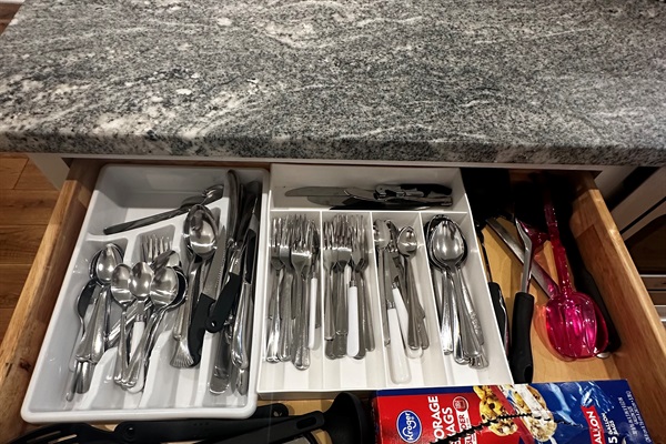 Fully stocked kitchen - silverware, wine opener, various kitchen utensils