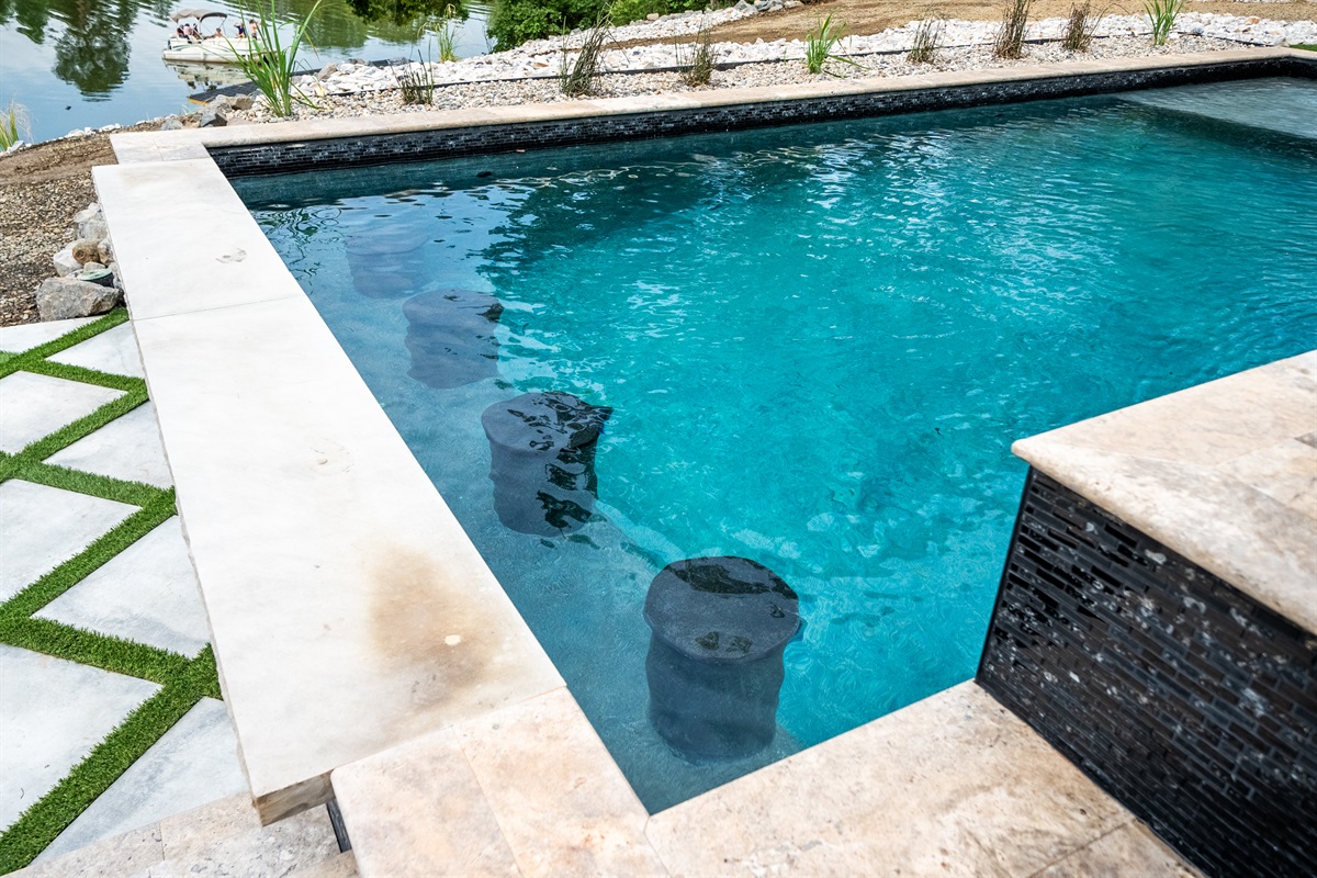 Soak in the pool while your friends sit by the fire.  The best of both worlds!