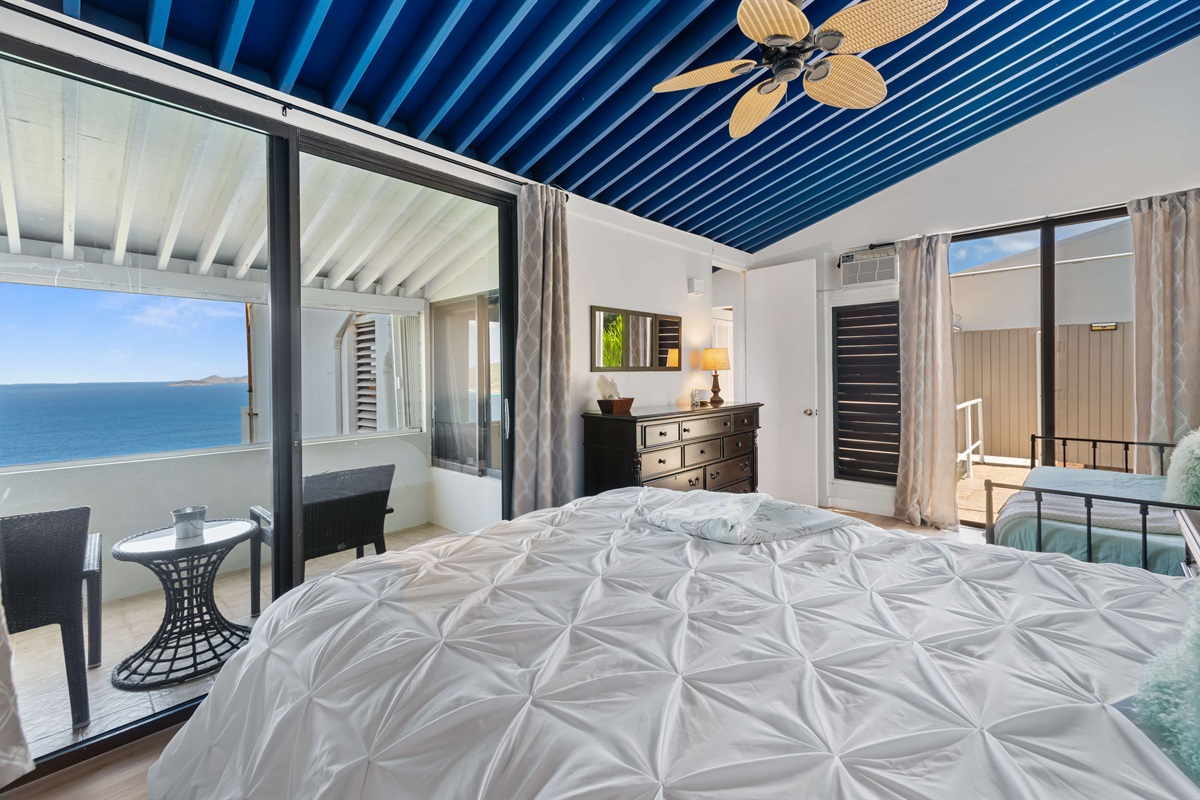 Elegant and calming, with private balcony access to watch the Caribbean sunrise.