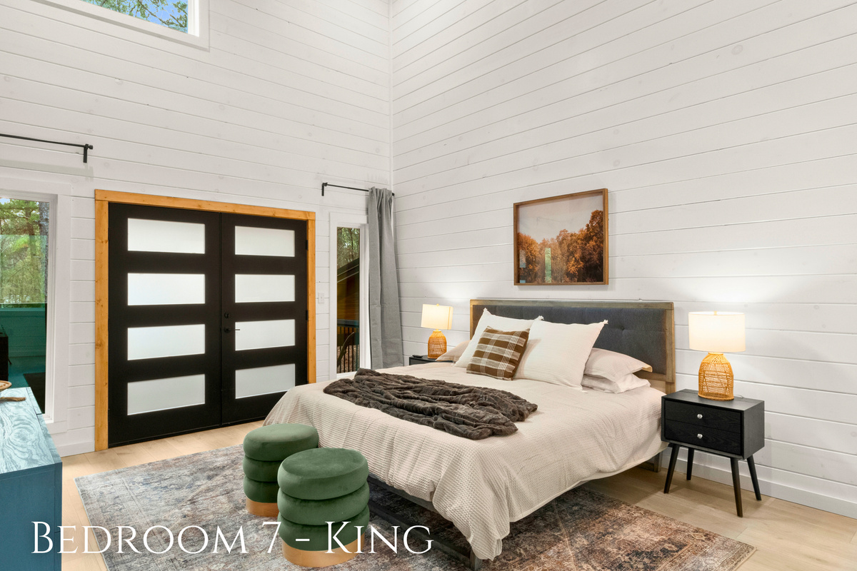This bedroom offers a regal rest, complete with all the comforts of a contemporary home.