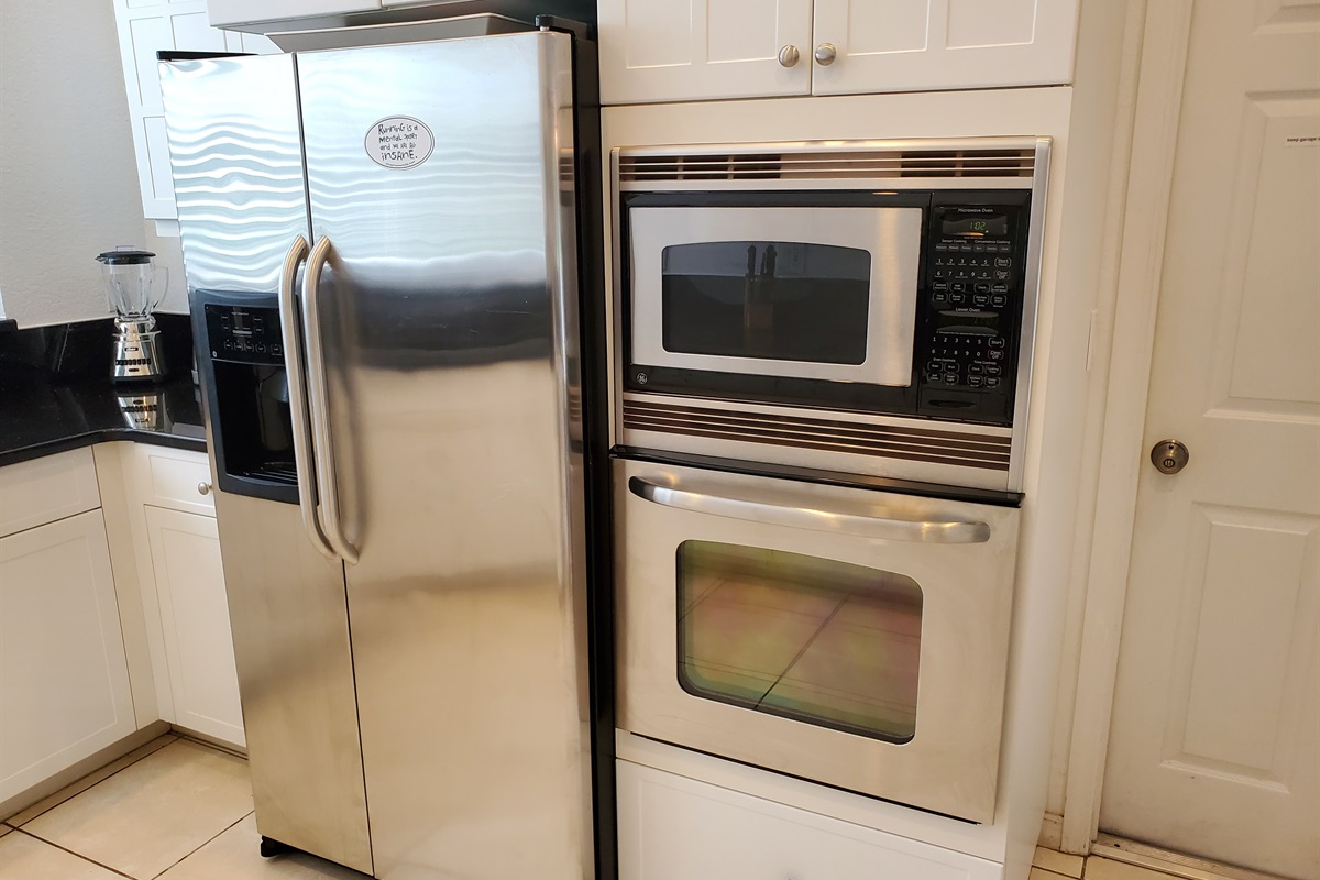 Kitchen refrigerator, microwave and oven