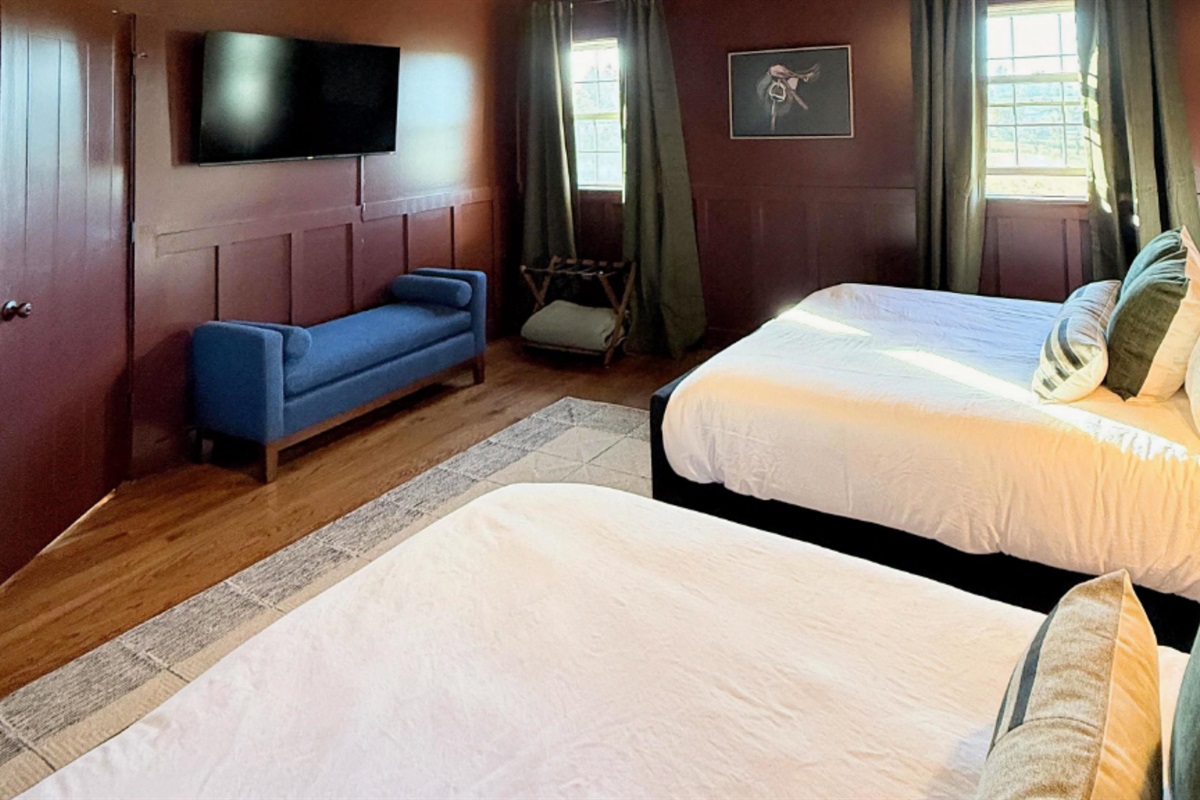 Classic charm meets contemporary comfort — soft lighting and tailored details create a welcoming space for conversation, reflection, or a quiet moment before the next day’s trail adventures.