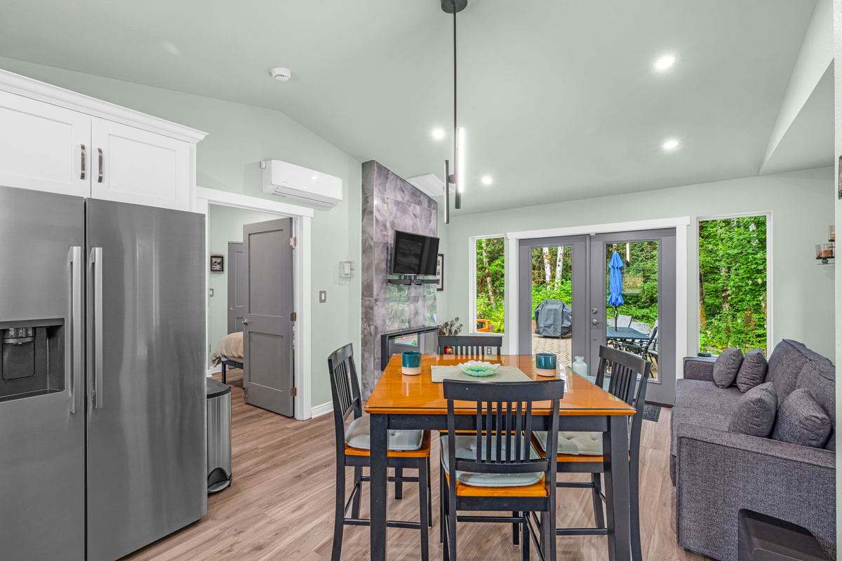 The dining table serves double duty as a workstation for those needing to catch up on email or work remotely, with our gig speed symmetrical fiber internet.