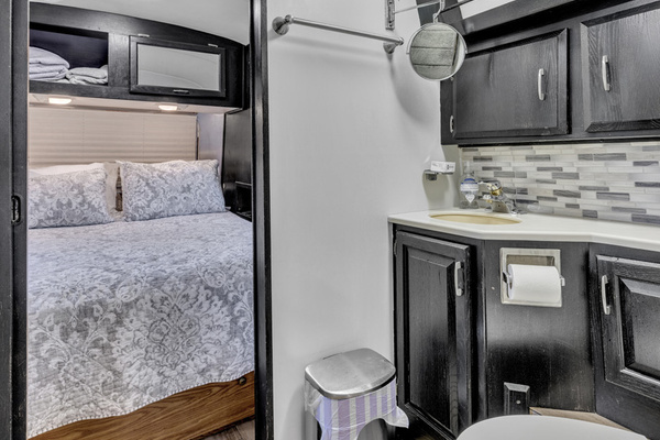 Bathroom with sink, storage