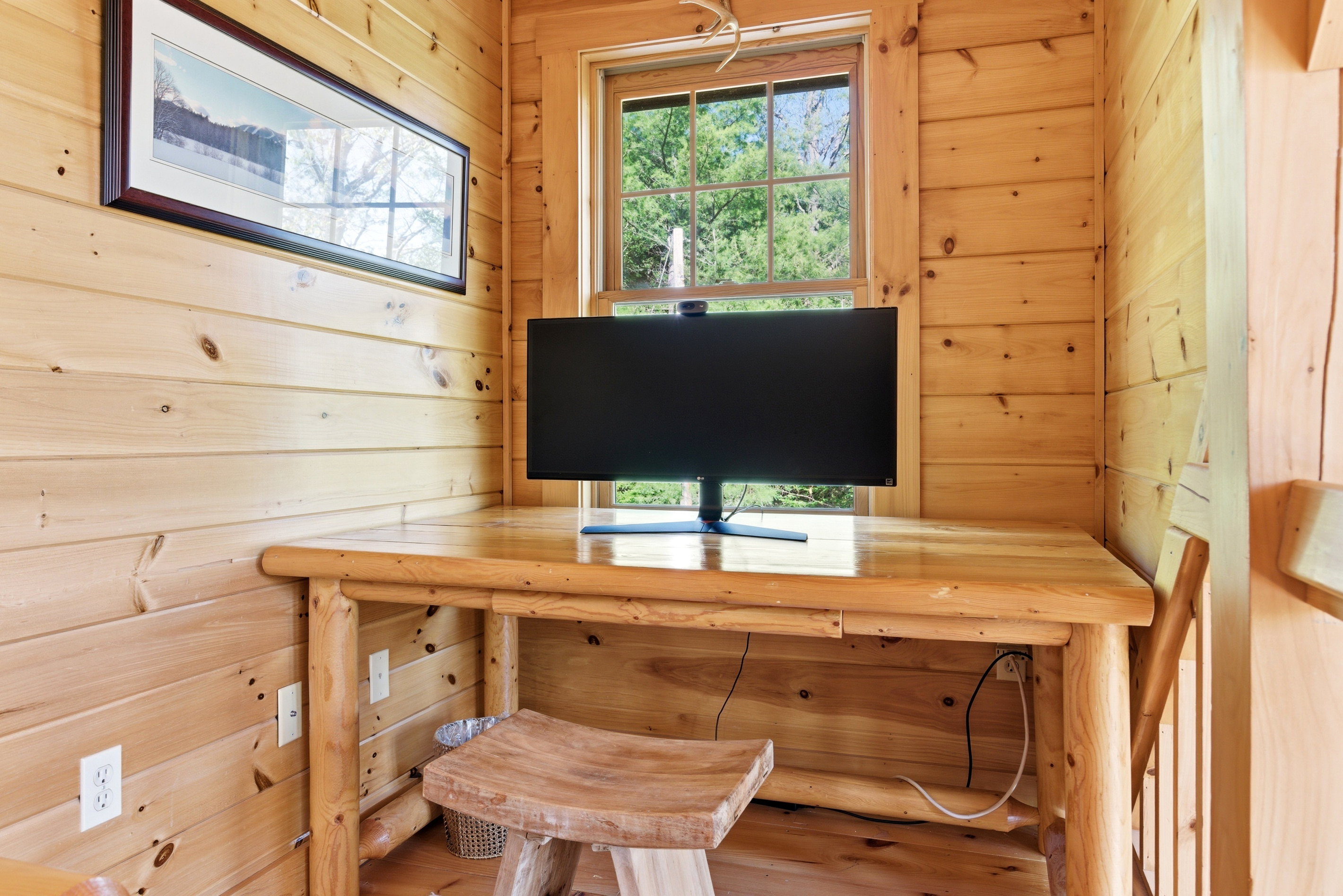 Dedicated workspace with natural light, perfect for checking emails or working remotely.