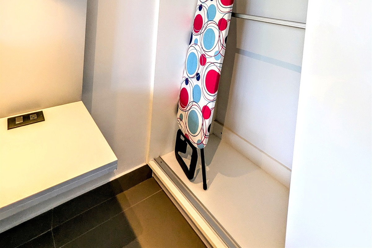 Iron and Ironing board in guest bedroom 1