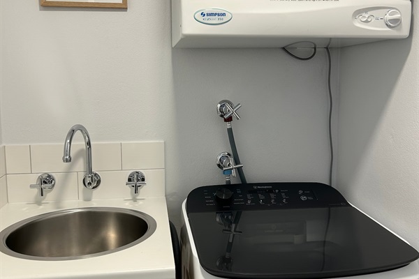 Internal laundry - washing machine & dryer.