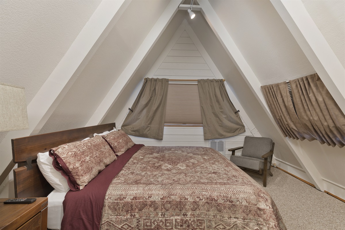 Upper level bedroom with king bed