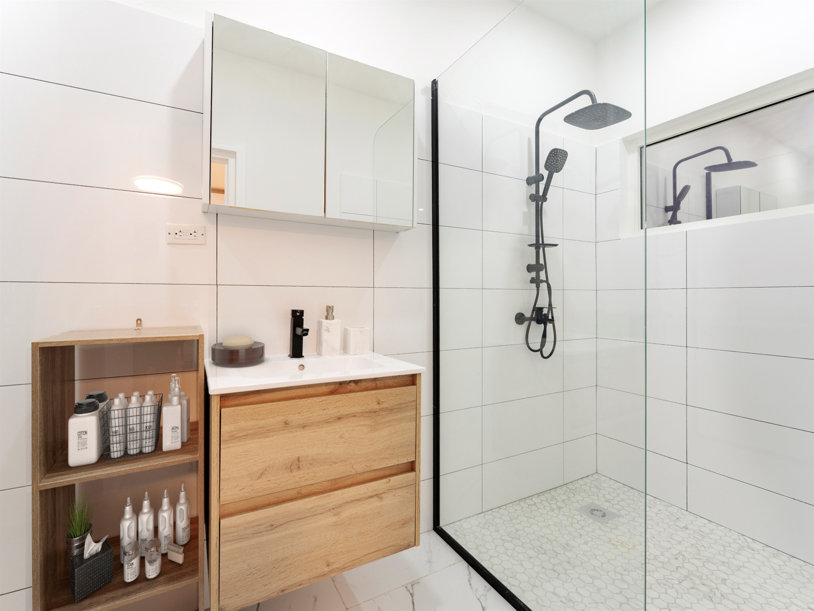 Second full bathroom with vanity and glass-enclosed walk-in shower