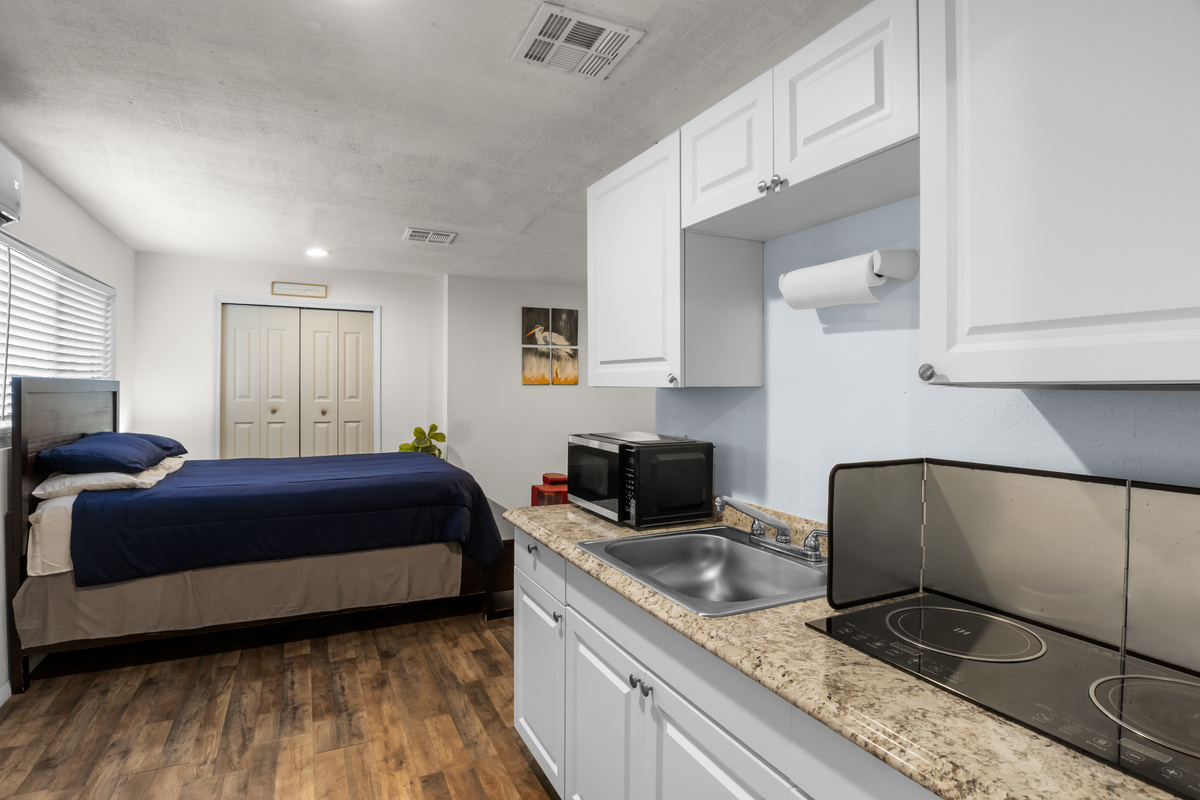 Kitchen includes two stove burners.