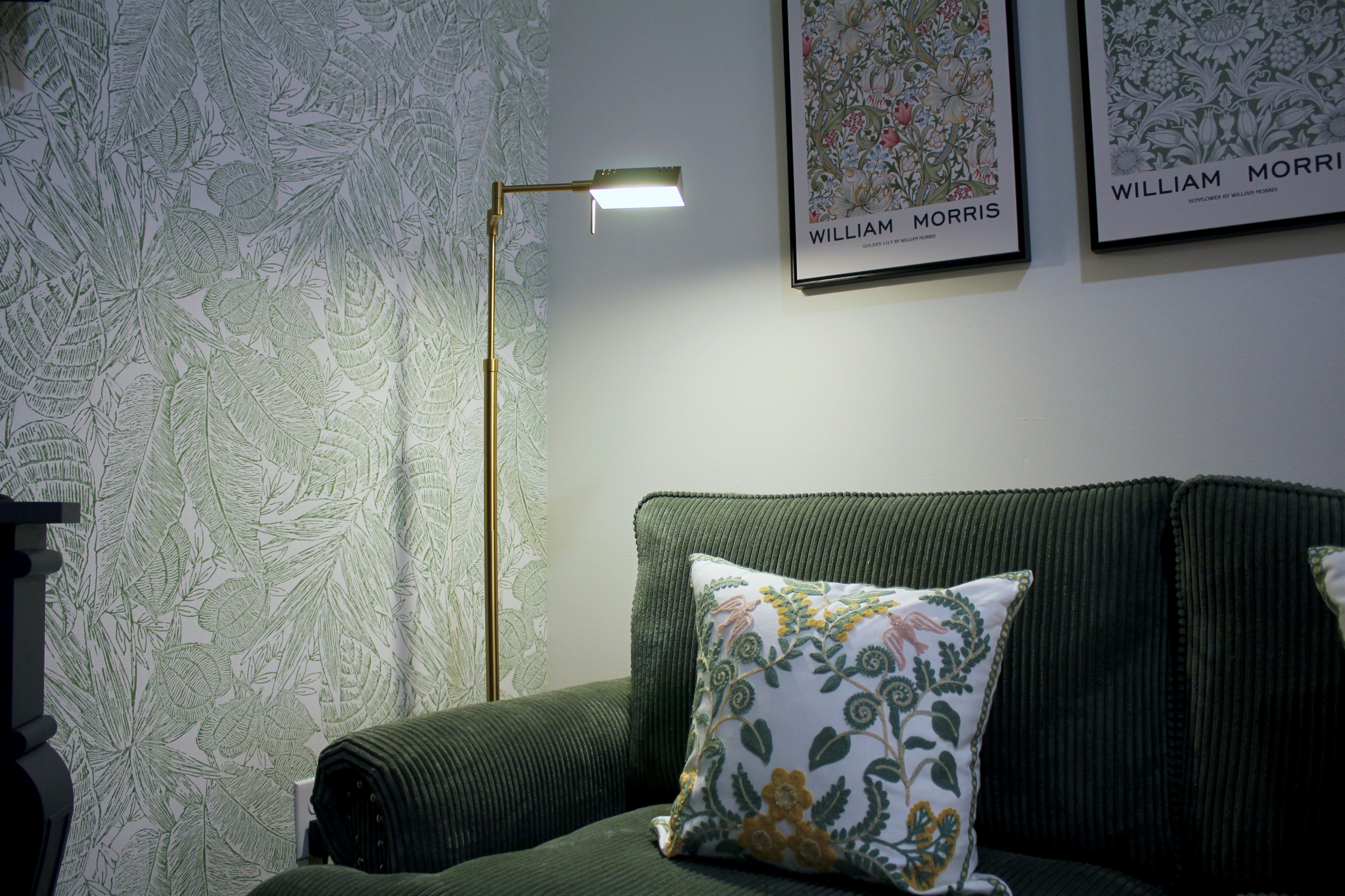 Soft pillows and warm textures create a welcoming vibe.