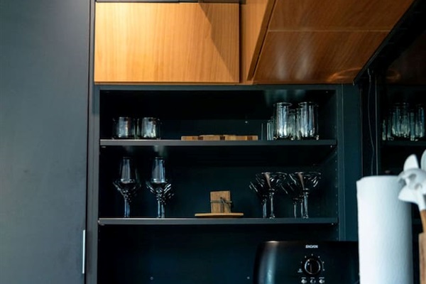 Fully equipped kitchen with modern appliances, ample counter space, and all the essentials needed to cook and dine in comfort.