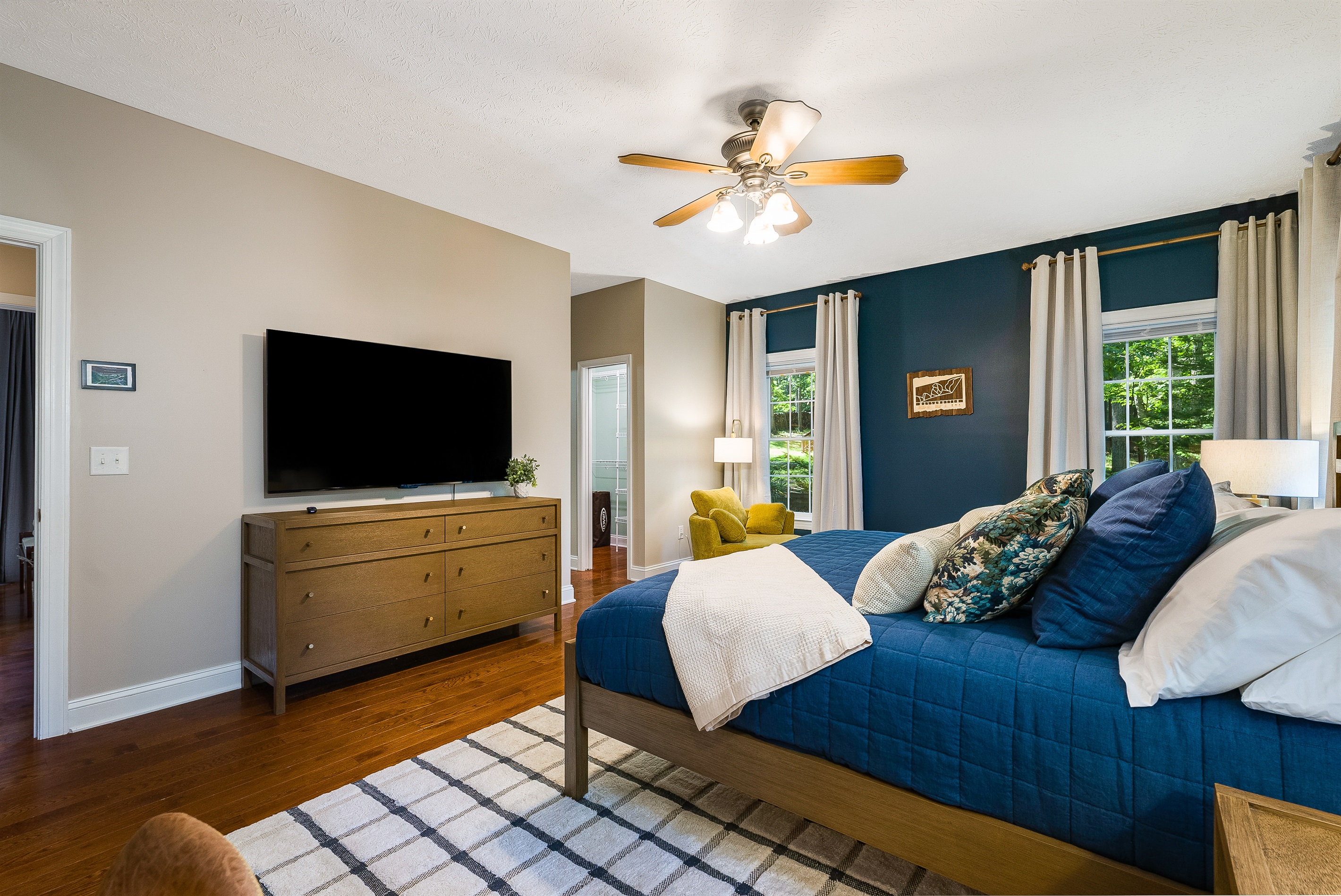 Unwind with a movie from bed — every detail in this king suite was designed for both comfort and style