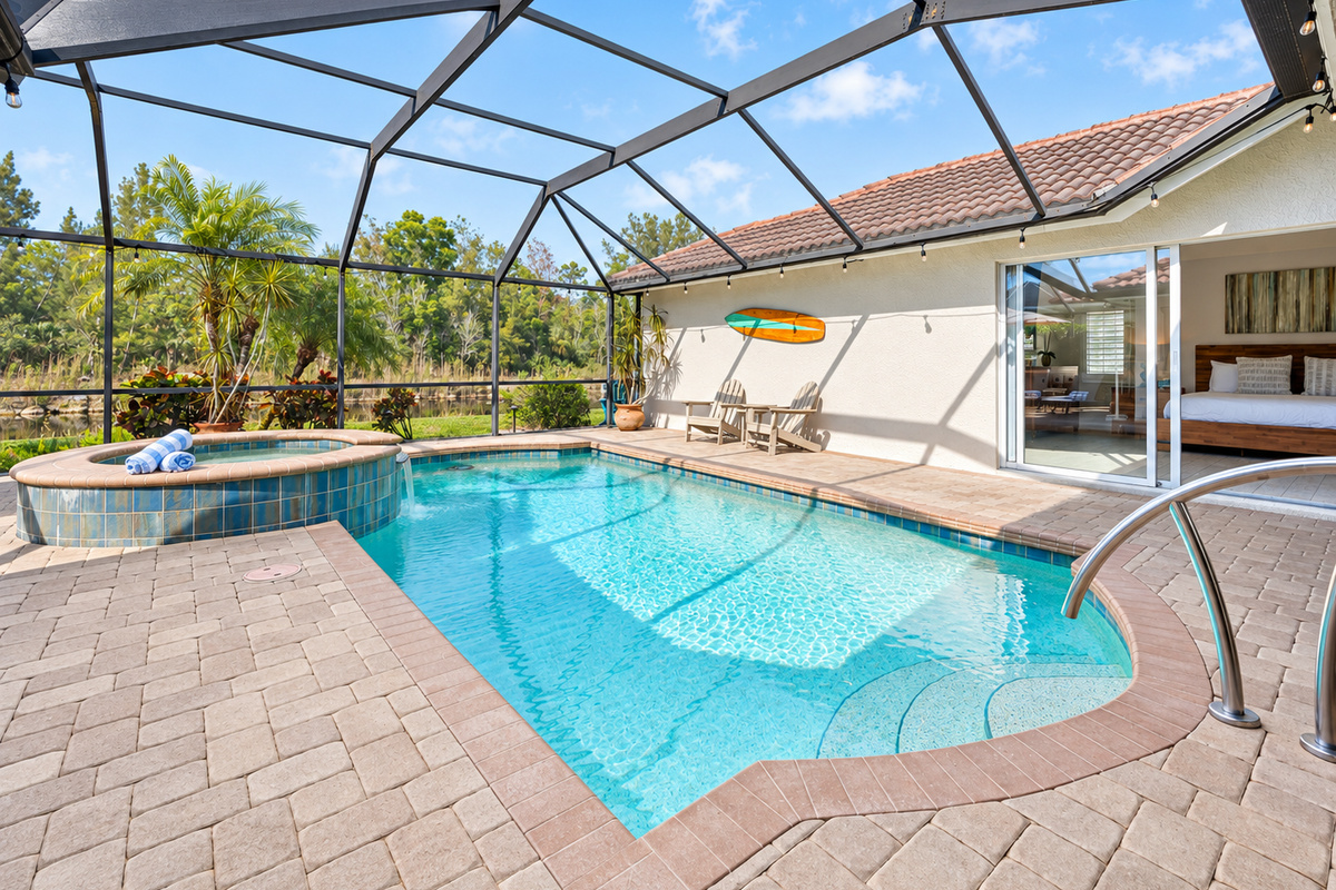 Screened for comfort, surrounded by palms — enjoy the outdoors with total privacy