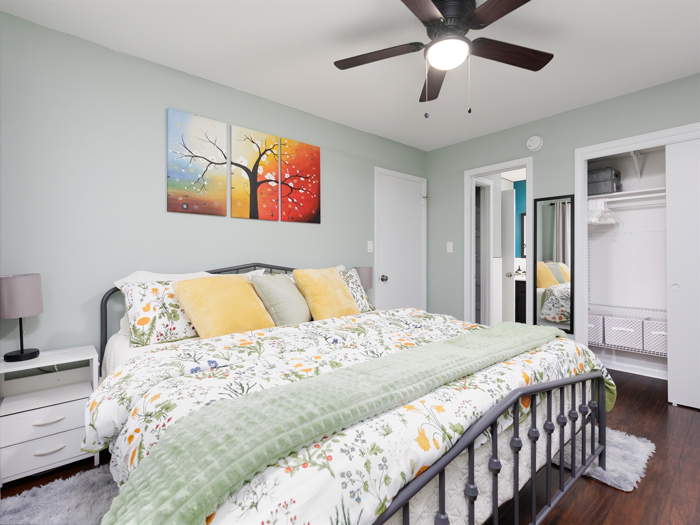 Primary bedroom highlighting generous floor space, closet with extra linens and storage and direct bathroom access.