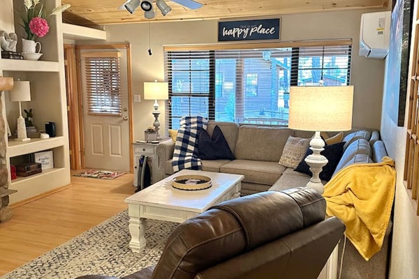 Cozy sectional and leather recliner for enjoying your favorite shows!